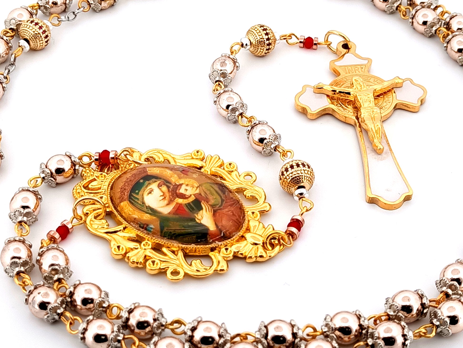 Our Lady of Perpetual Help unique rosary beads rose gold hematite gemstone and 18K gold plated cubic zirconia rosary with white enamel and gold Saint Benedict crucifix.
