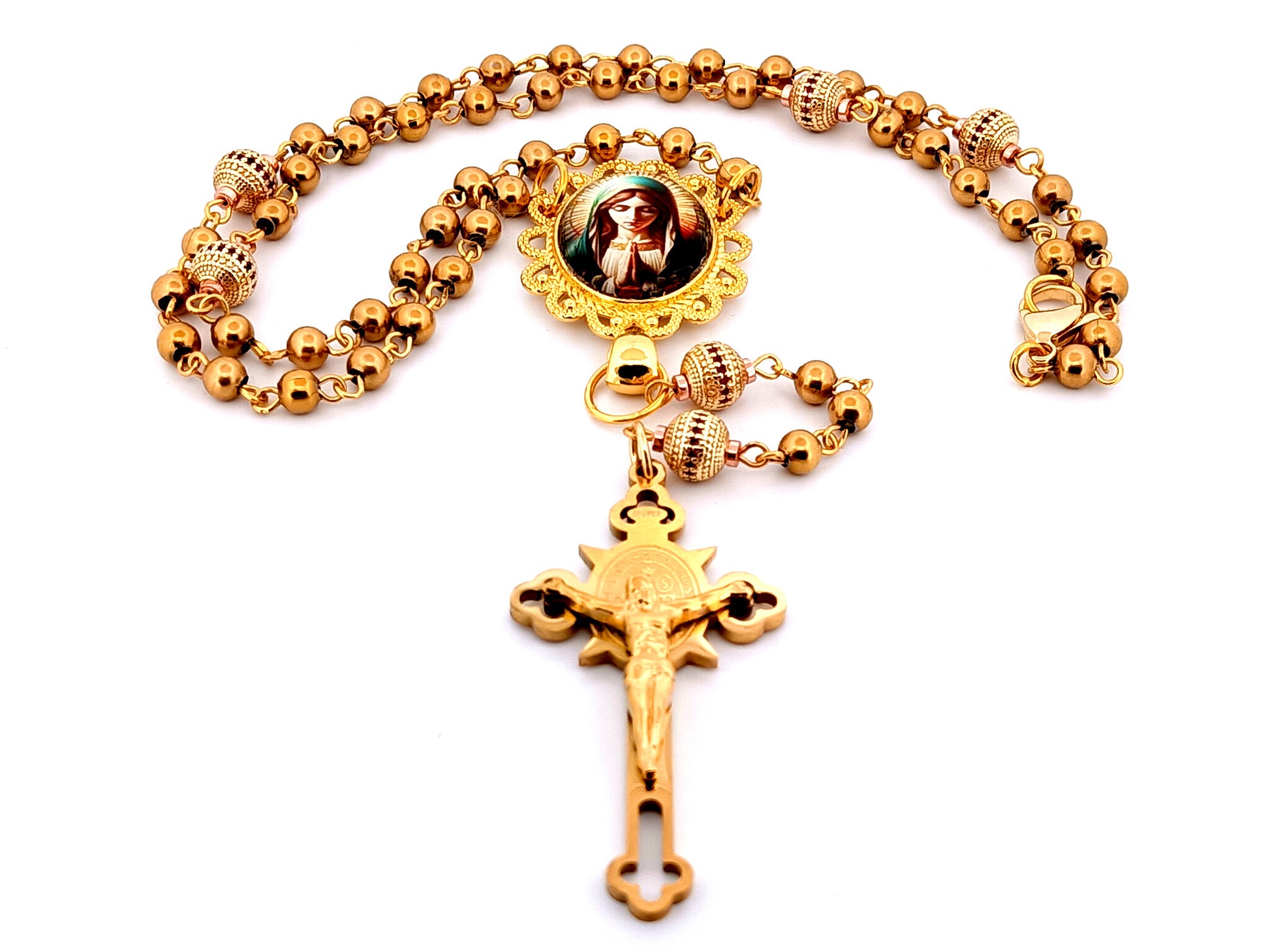 Our Lady at prayer unique rosary beads gold plated stainless steel and 18K gold plated cubic zirconia rosary with gold plated Saint Benedict crucifix.