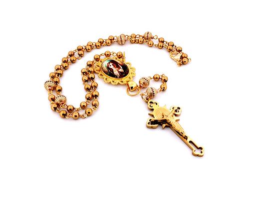 Our Lady at prayer unique rosary beads gold plated stainless steel and 18K gold plated cubic zirconia rosary with gold plated Saint Benedict crucifix.
