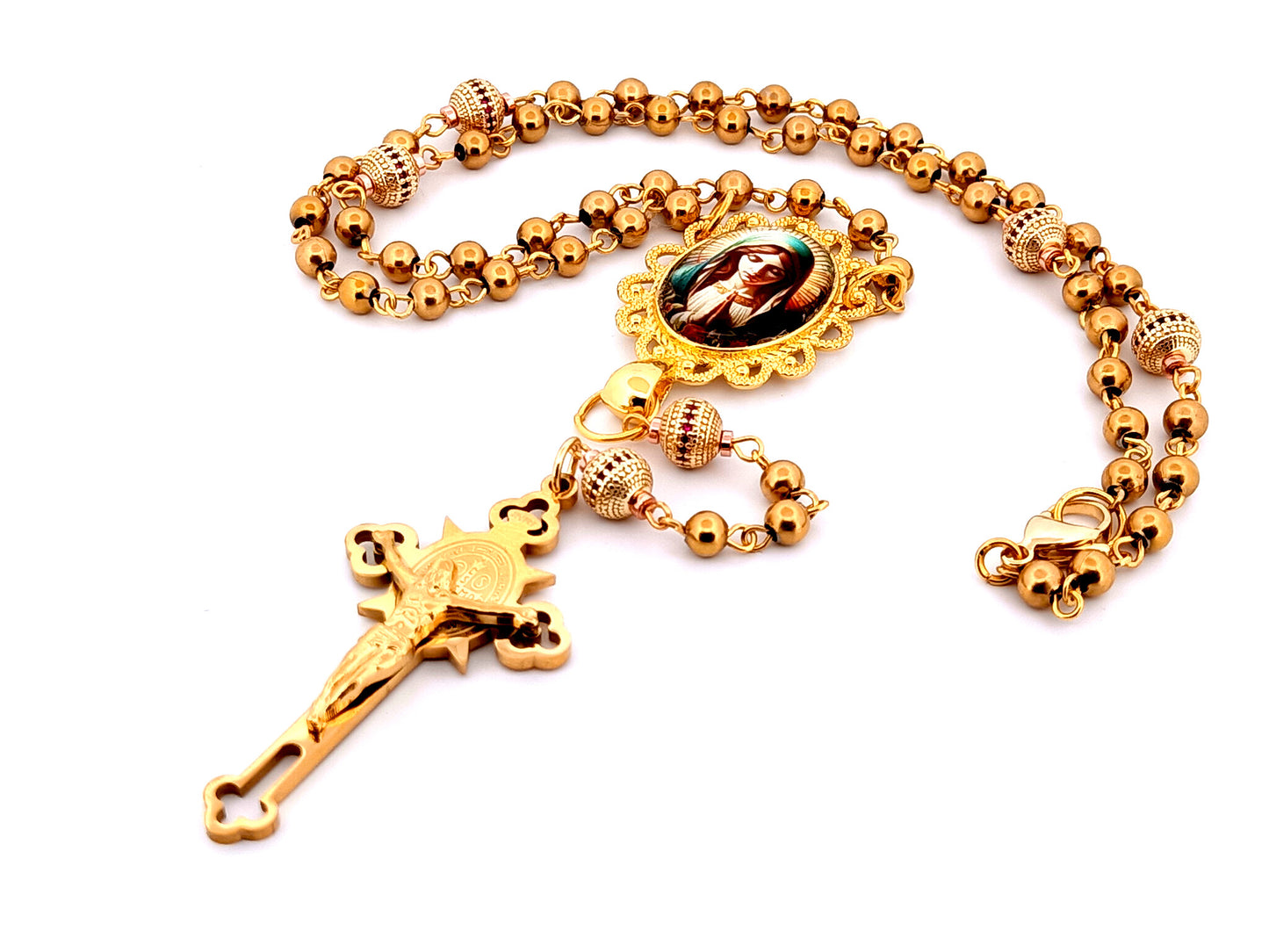 Our Lady at prayer unique rosary beads gold plated stainless steel and 18K gold plated cubic zirconia rosary with gold plated Saint Benedict crucifix.