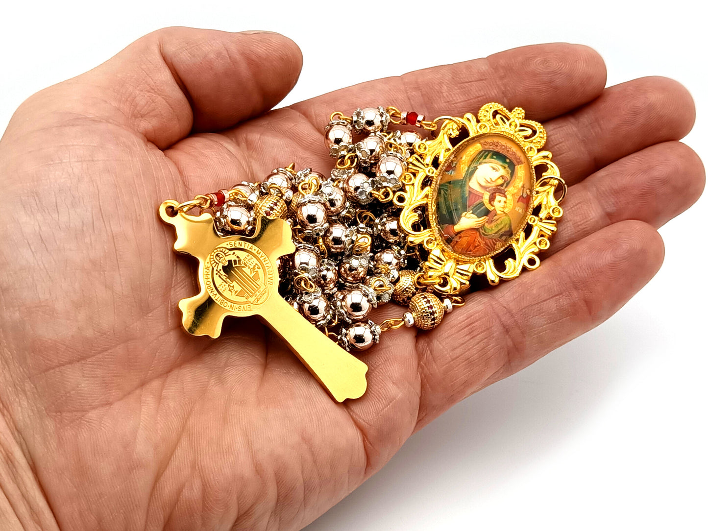 Our Lady of Perpetual Help unique rosary beads rose gold hematite gemstone and 18K gold plated cubic zirconia rosary with white enamel and gold Saint Benedict crucifix.