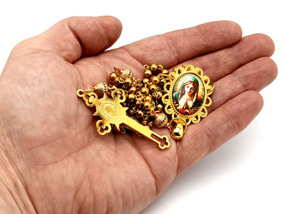 Our Lady at prayer unique rosary beads gold plated stainless steel and 18K gold plated cubic zirconia rosary with gold plated Saint Benedict crucifix.