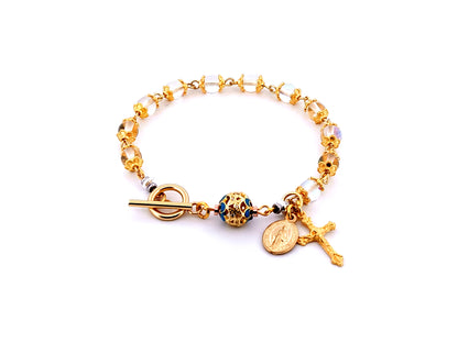 Miraculous medal unique rosary beads angel aura crystal gemstone and 18K gold single decade rosary bracelet with gold plated crucifix.