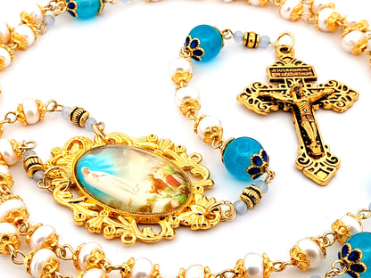 Our Lady of Fatima unique rosary beads freshwater pearl and blue glass rosary with gold plated Pardon crucifix.