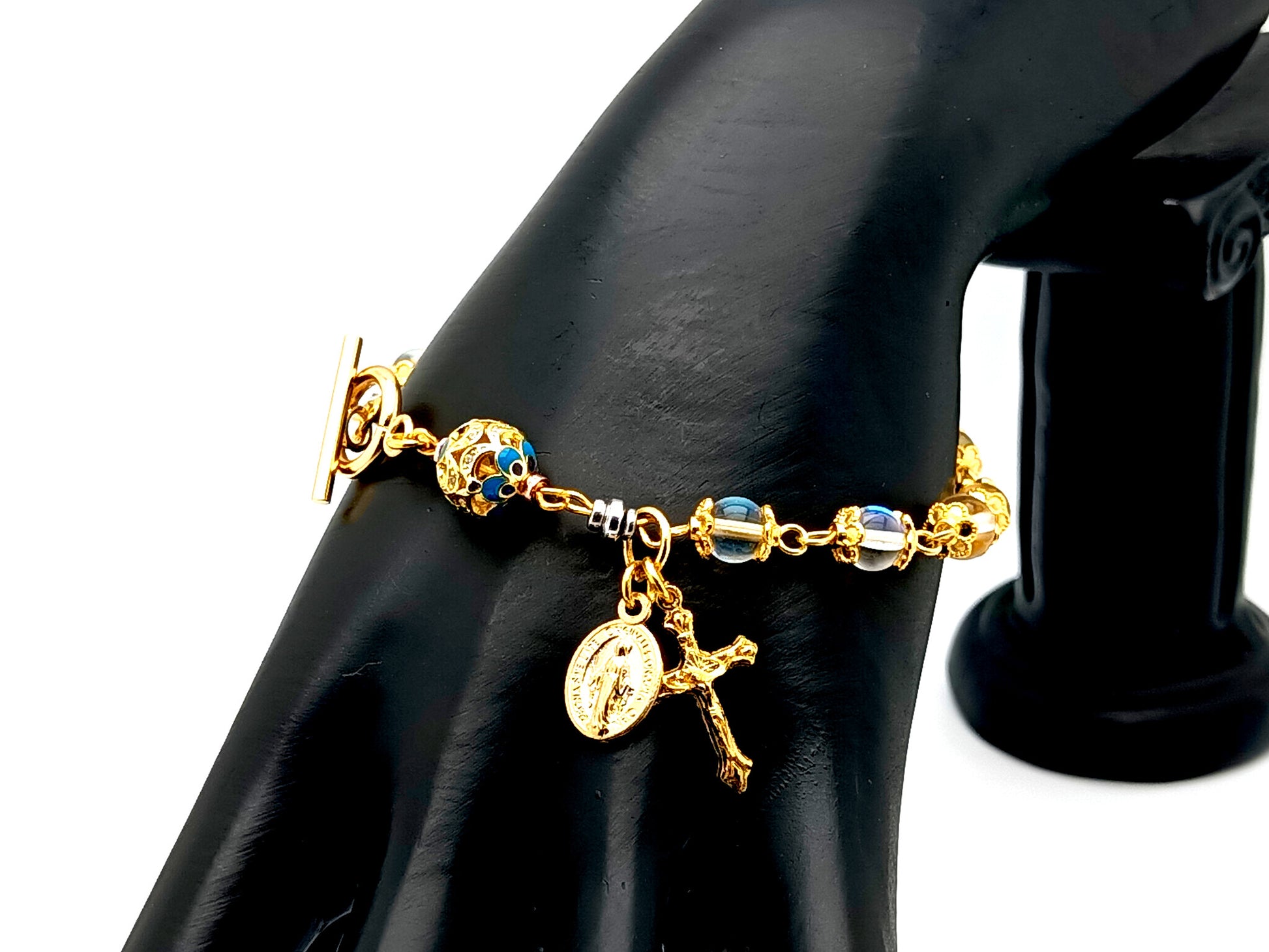 Miraculous medal unique rosary beads angel aura crystal gemstone and 18K gold single decade rosary bracelet with gold plated crucifix.