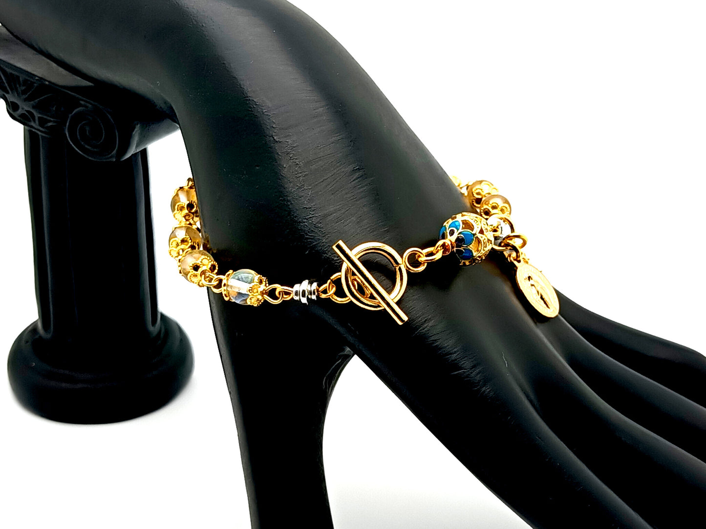 Miraculous medal unique rosary beads angel aura crystal gemstone and 18K gold single decade rosary bracelet with gold plated crucifix.