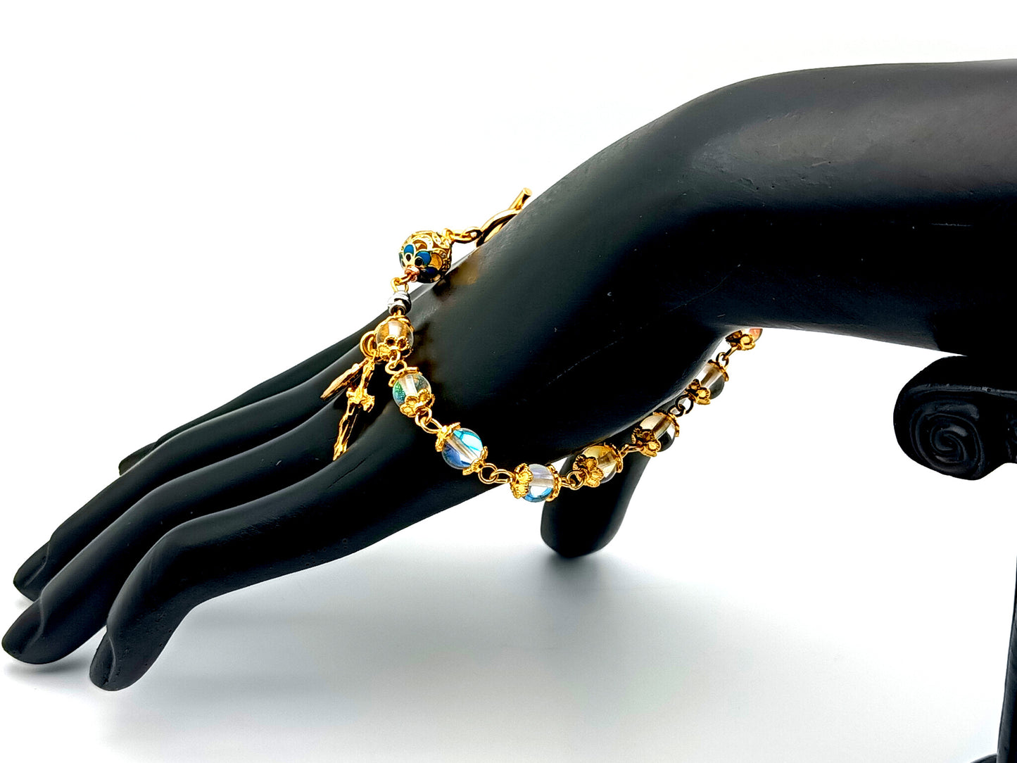 Miraculous medal unique rosary beads angel aura crystal gemstone and 18K gold single decade rosary bracelet with gold plated crucifix.