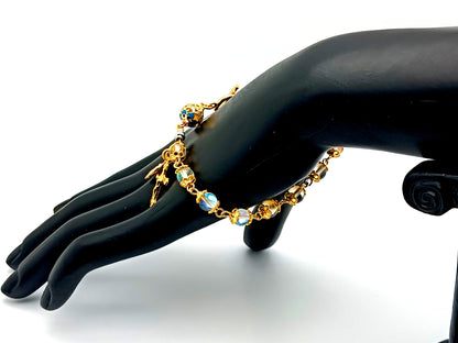 Miraculous medal unique rosary beads angel aura crystal gemstone and 18K gold single decade rosary bracelet with gold plated crucifix.