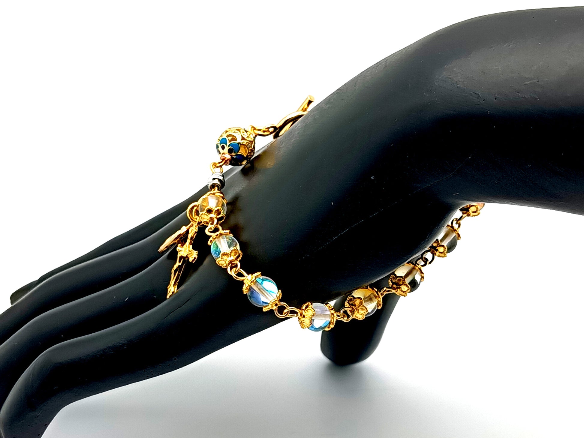 Miraculous medal unique rosary beads angel aura crystal gemstone and 18K gold single decade rosary bracelet with gold plated crucifix.