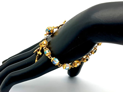 Miraculous medal unique rosary beads angel aura crystal gemstone and 18K gold single decade rosary bracelet with gold plated crucifix.