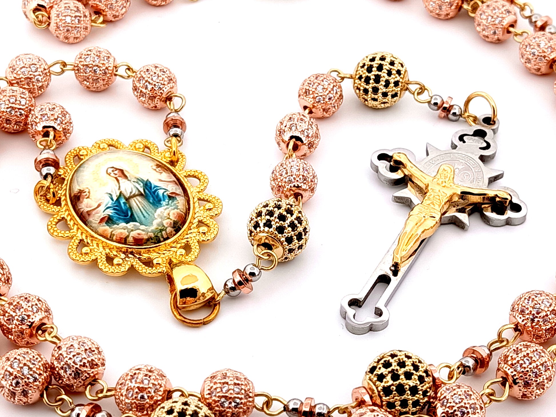 Our Lady Queen of Heaven unique rosary beads rose gold and 18K gold plated cubic zirconia rosary with gold plated Saint Benedict crucifix.