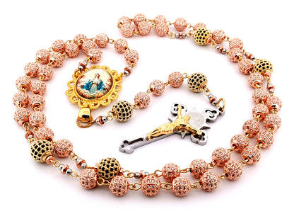 Our Lady Queen of Heaven unique rosary beads rose gold and 18K gold plated cubic zirconia rosary with gold plated Saint Benedict crucifix.