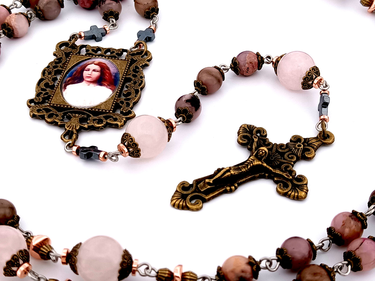 Saint Maria unique rosary beads Goretti rhodonite and pink quartz gemstone rosary with bronze filigree crucifix.