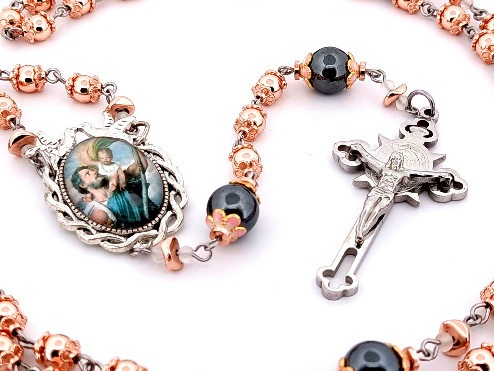 Saint Christopher unique rosary beads rose gold hematite gemstone rosary with black stainless steel Saint Benedict crucifix.
