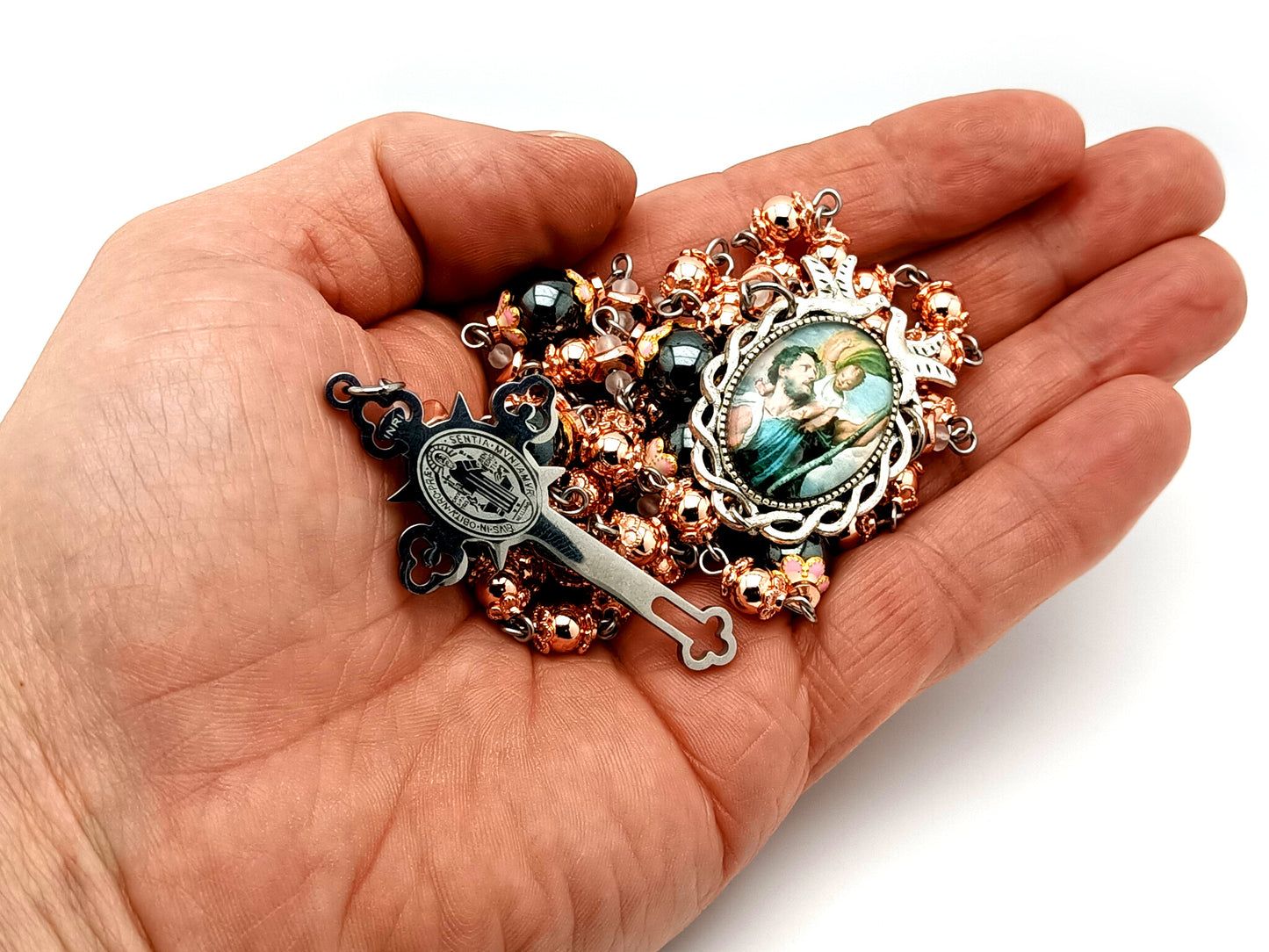 Saint Christopher unique rosary beads rose gold hematite gemstone rosary with black stainless steel Saint Benedict crucifix.