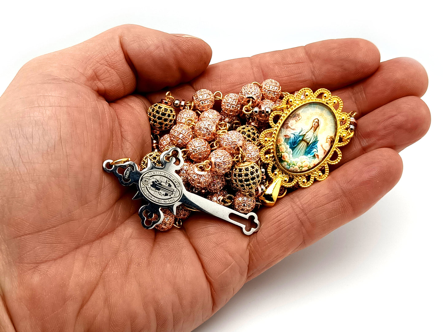 Our Lady Queen of Heaven unique rosary beads rose gold and 18K gold plated cubic zirconia rosary with gold plated Saint Benedict crucifix.