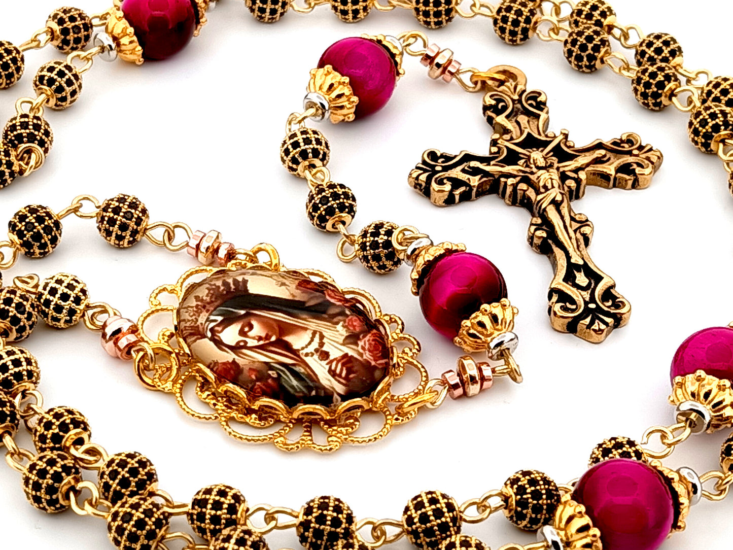 Queen of Heaven 18K gold plated cubic zirconia and pink tigers eye gemstone rosary beads with gold plated filigree crucifix.
