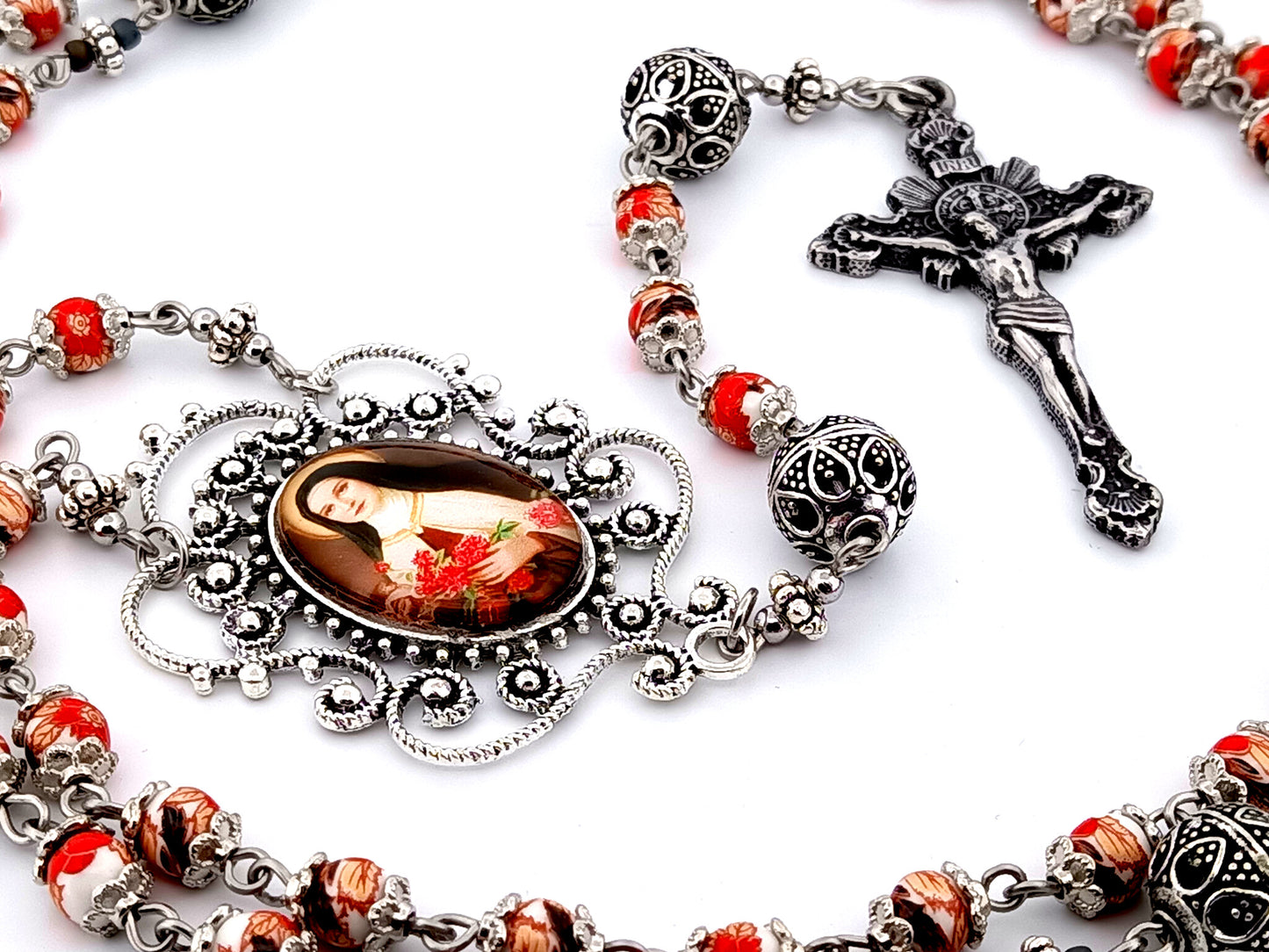 Saint Teresa of Lisieux unique rosary beads floral porcelain and silver rosary with sunburst crucifix.