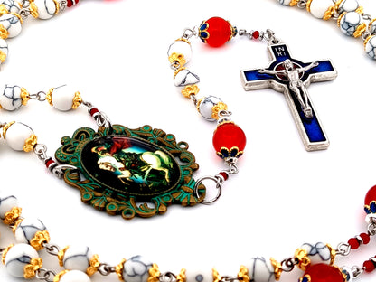 Saint George unique rosary beads howlite and ruby gemstone rosary with Holy Spirit blue and red enamel crucifix.