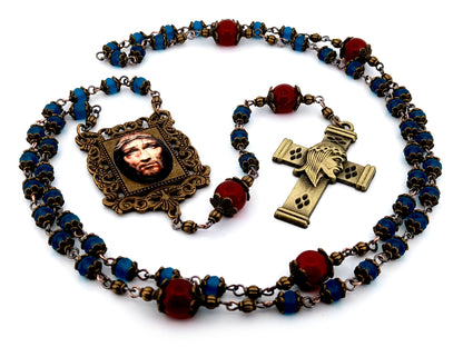 Holy Face of Jesus unique rosary beads faceted blue and red glass rosary with brass Holy Face crucifix.