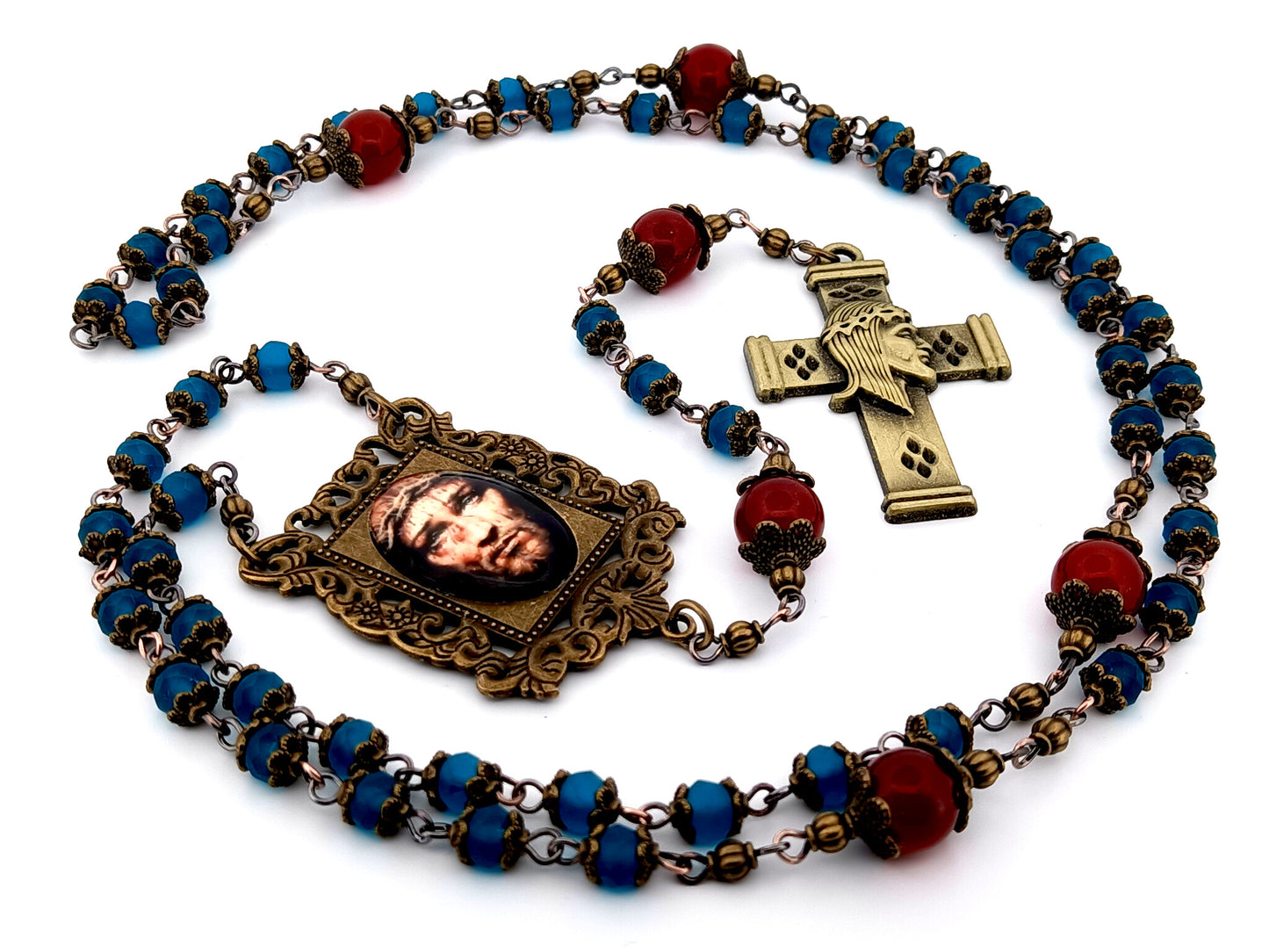 Holy Face of Jesus unique rosary beads faceted blue and red glass rosary with brass Holy Face crucifix.
