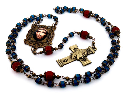 Holy Face of Jesus unique rosary beads faceted blue and red glass rosary with brass Holy Face crucifix.