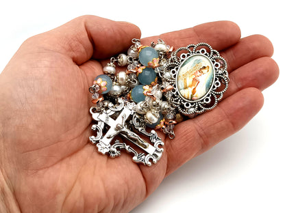 Virgin Mary unique rosary beads freshwater pearl and blue glass rosary with filigree crucifix.