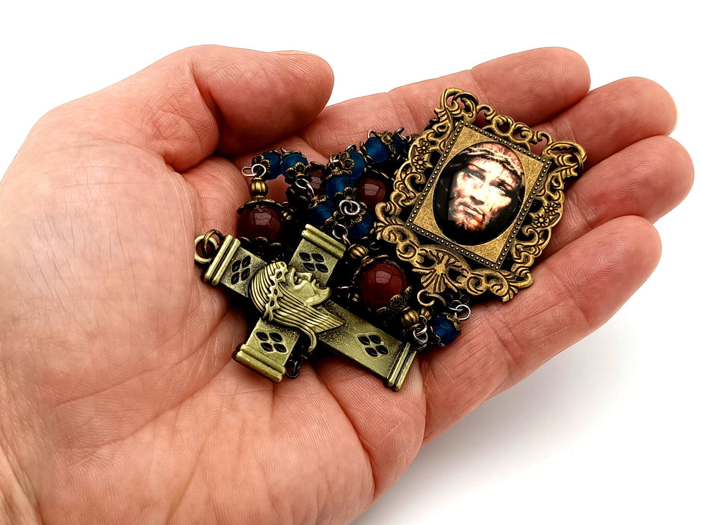Holy Face of Jesus unique rosary beads faceted blue and red glass rosary with brass Holy Face crucifix.