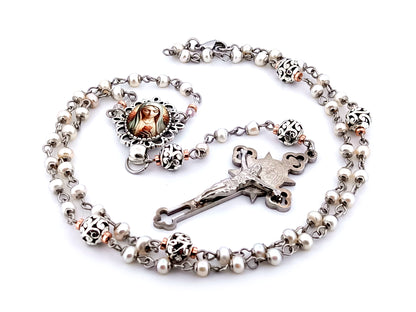 Virgin Mary unique rosary beads freshwater pearl and silver lattice rosary with Saint Benedict crucifix.