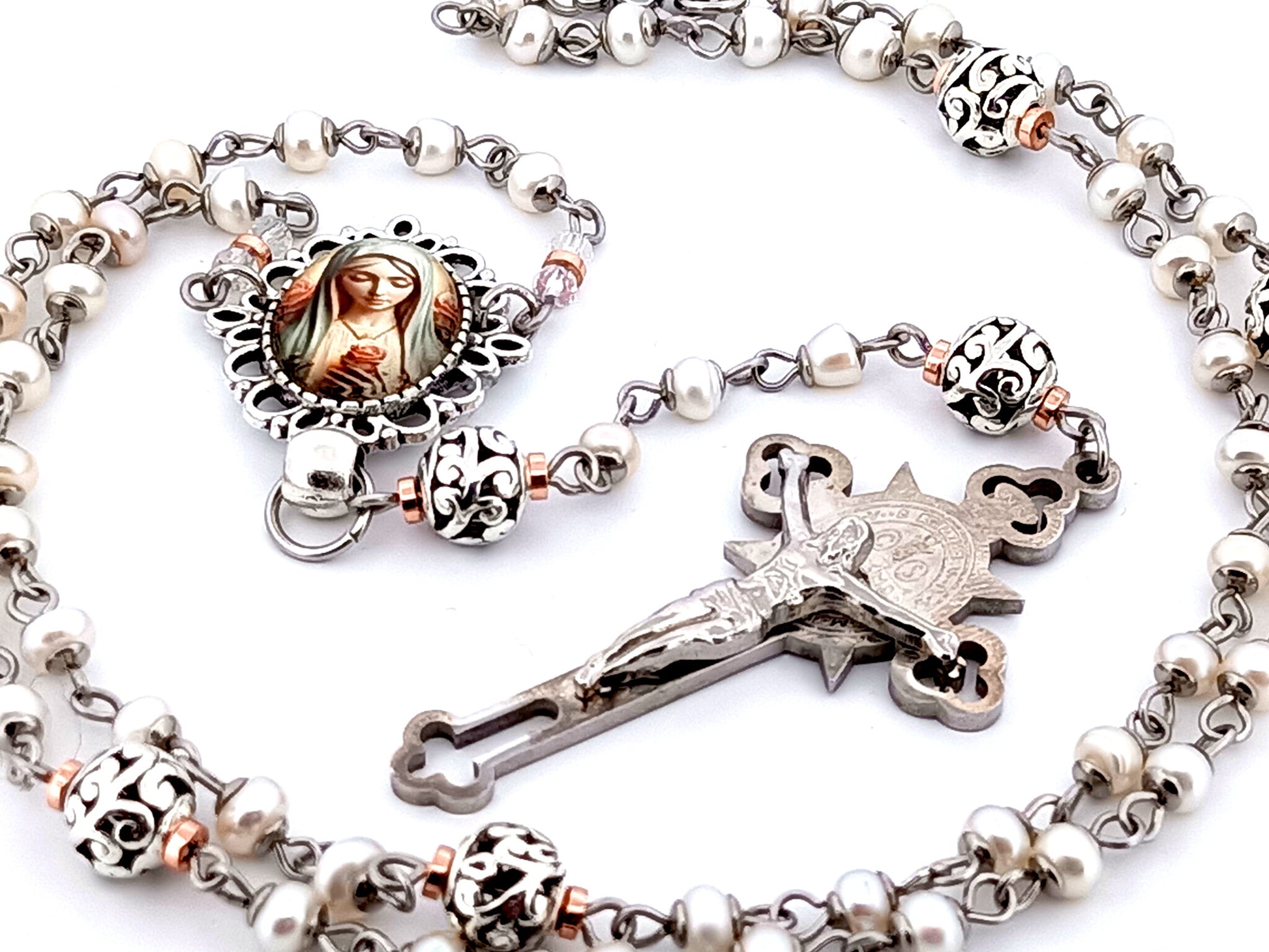 Virgin Mary unique rosary beads freshwater pearl and silver lattice rosary with Saint Benedict crucifix.