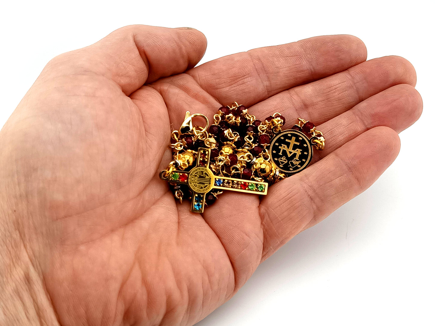 Miraculous Medal unique rosary beads garnet gemstone and gold plated hematite rosary with gold plated cubic zirconia crucifix.