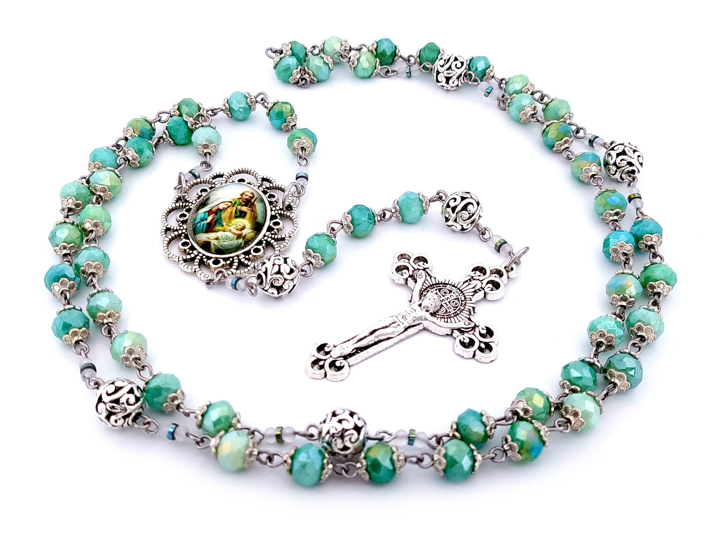 Holy Family unique rosary beads faceted aqua glass and silver rosary with Saint Benedict crucifix.