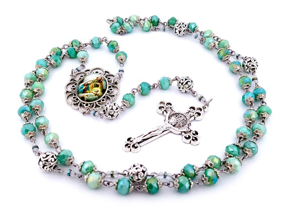 Holy Family unique rosary beads faceted aqua glass and silver rosary with Saint Benedict crucifix.