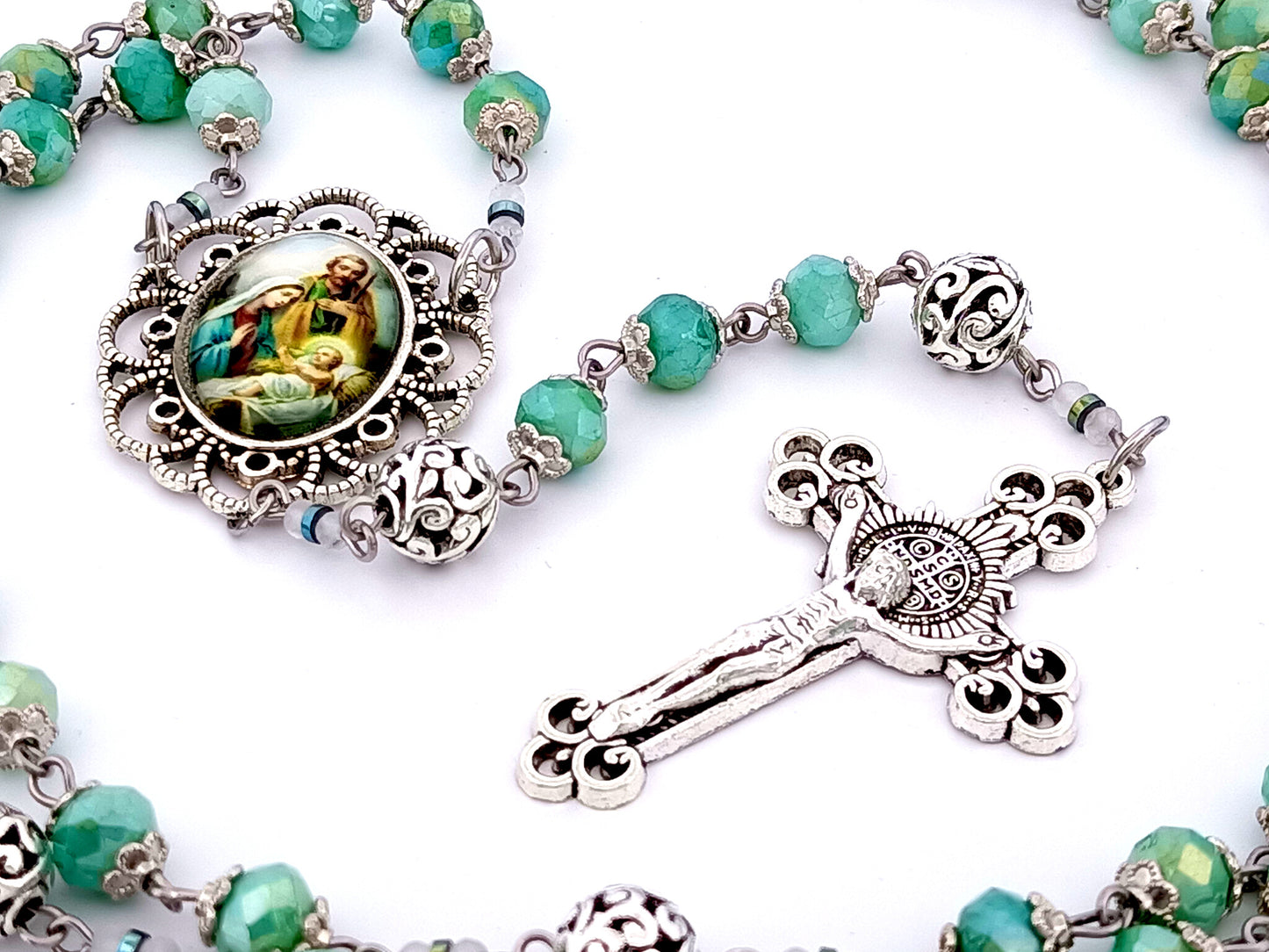 Holy Family unique rosary beads faceted aqua glass and silver rosary with Saint Benedict crucifix.