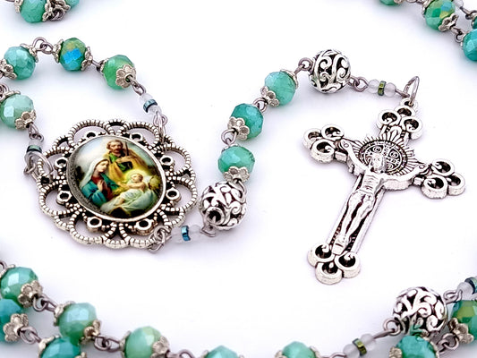 Holy Family unique rosary beads faceted aqua glass and silver rosary with Saint Benedict crucifix.
