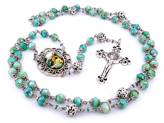 Holy Family unique rosary beads faceted aqua glass and silver rosary with Saint Benedict crucifix.