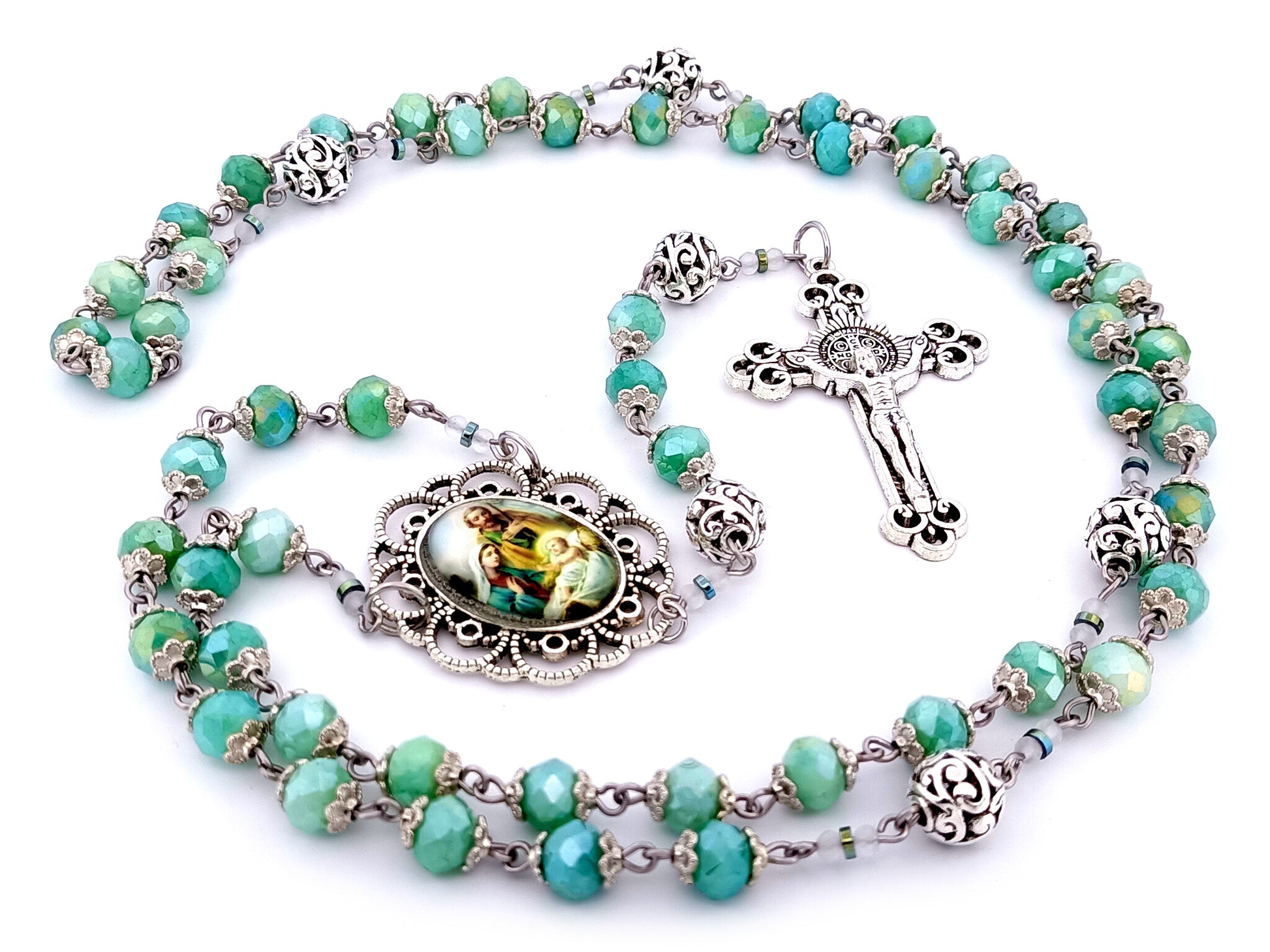 Holy Family unique rosary beads faceted aqua glass and silver rosary with Saint Benedict crucifix.