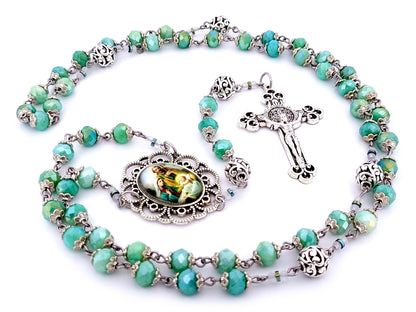 Holy Family unique rosary beads faceted aqua glass and silver rosary with Saint Benedict crucifix.