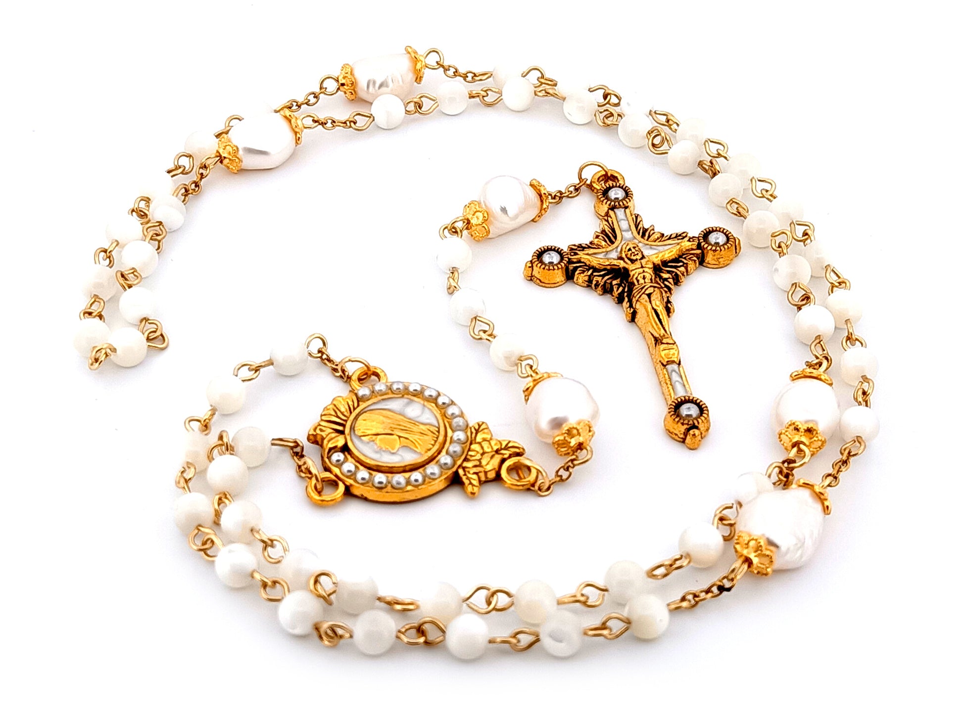 Virgin Mary unique rosary beads mother of pearl and fresh water pearl rosary with gold plated pearl sunburst crucifix.