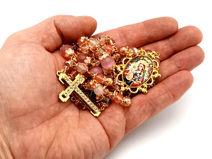 Our Lady of Perpetual Help unique rosary beads quartz gemstone and pink cats eye glass rosary with gold plated cubic zirconia cross.