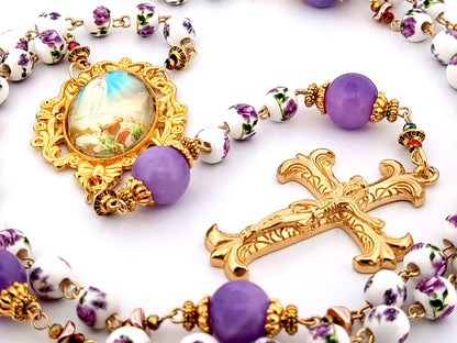 Our Lady of Fatima unique rosary beads porcelain and purple glass rosary with gold plated Fleur de Lys crucifix.