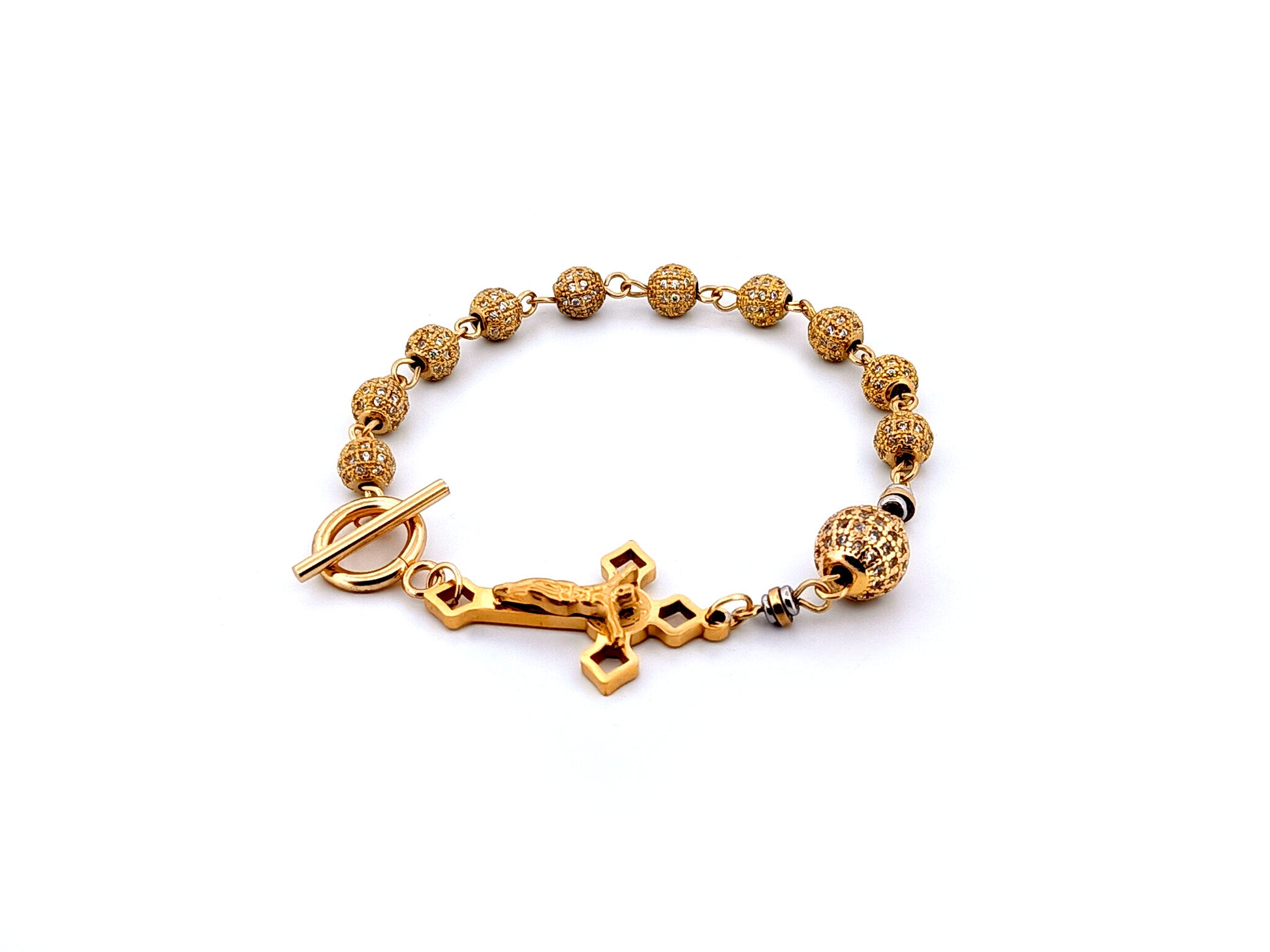 18K Gold cubic zirconia single decade rosary bracelet with gold plated Saint Benedict crucifix.