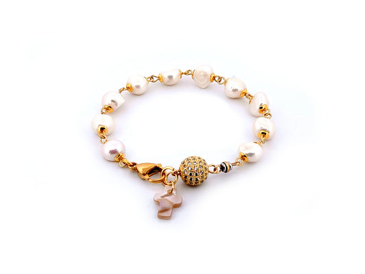 Mother of Pearl cross single decade rosary bracelet with freshwater pearls and 18K gold plated cubic zirconia beads.