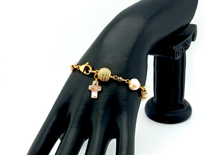 Mother of Pearl cross single decade rosary bracelet with freshwater pearls and 18K gold plated cubic zirconia beads.