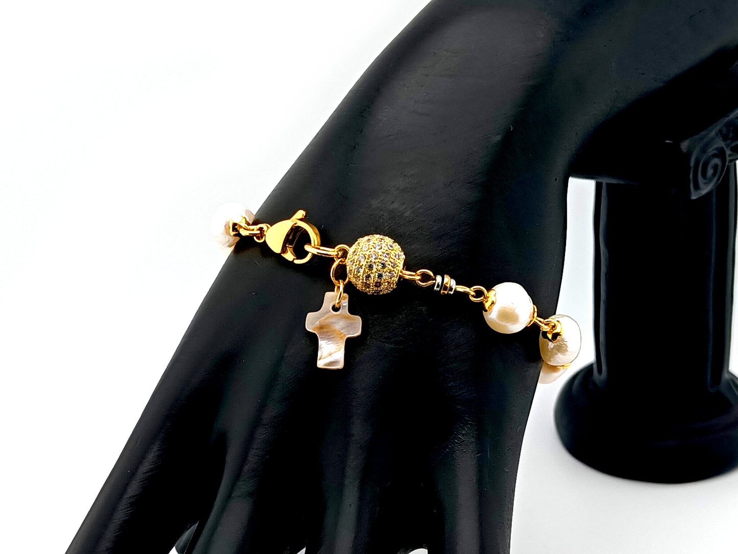 Mother of Pearl cross single decade rosary bracelet with freshwater pearls and 18K gold plated cubic zirconia beads.