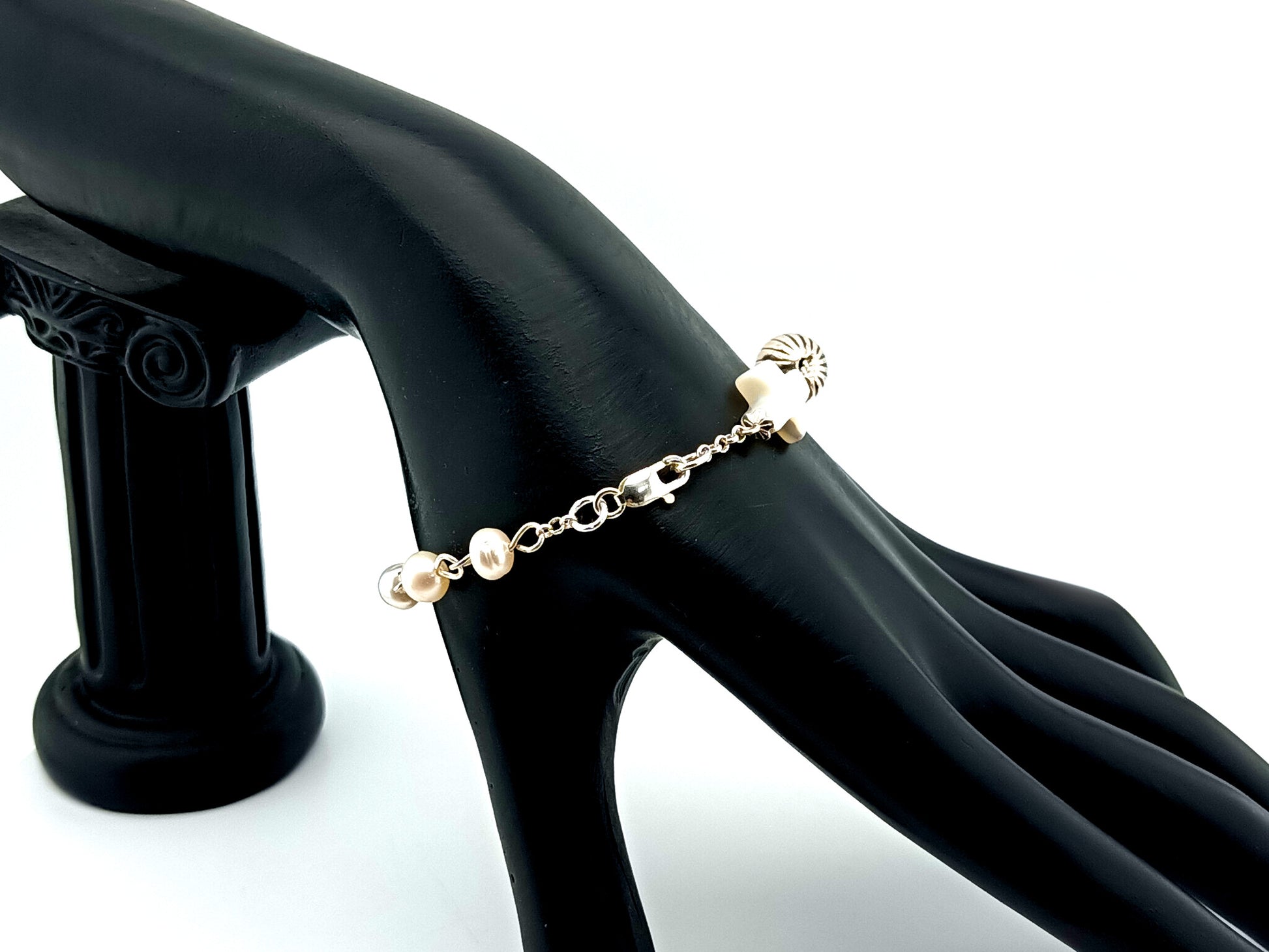 Natural pearl and 925 sterling silver single decade rosary bracelet with mother of pearl cross.