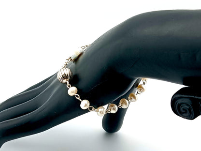 Natural pearl and 925 sterling silver single decade rosary bracelet with mother of pearl cross.
