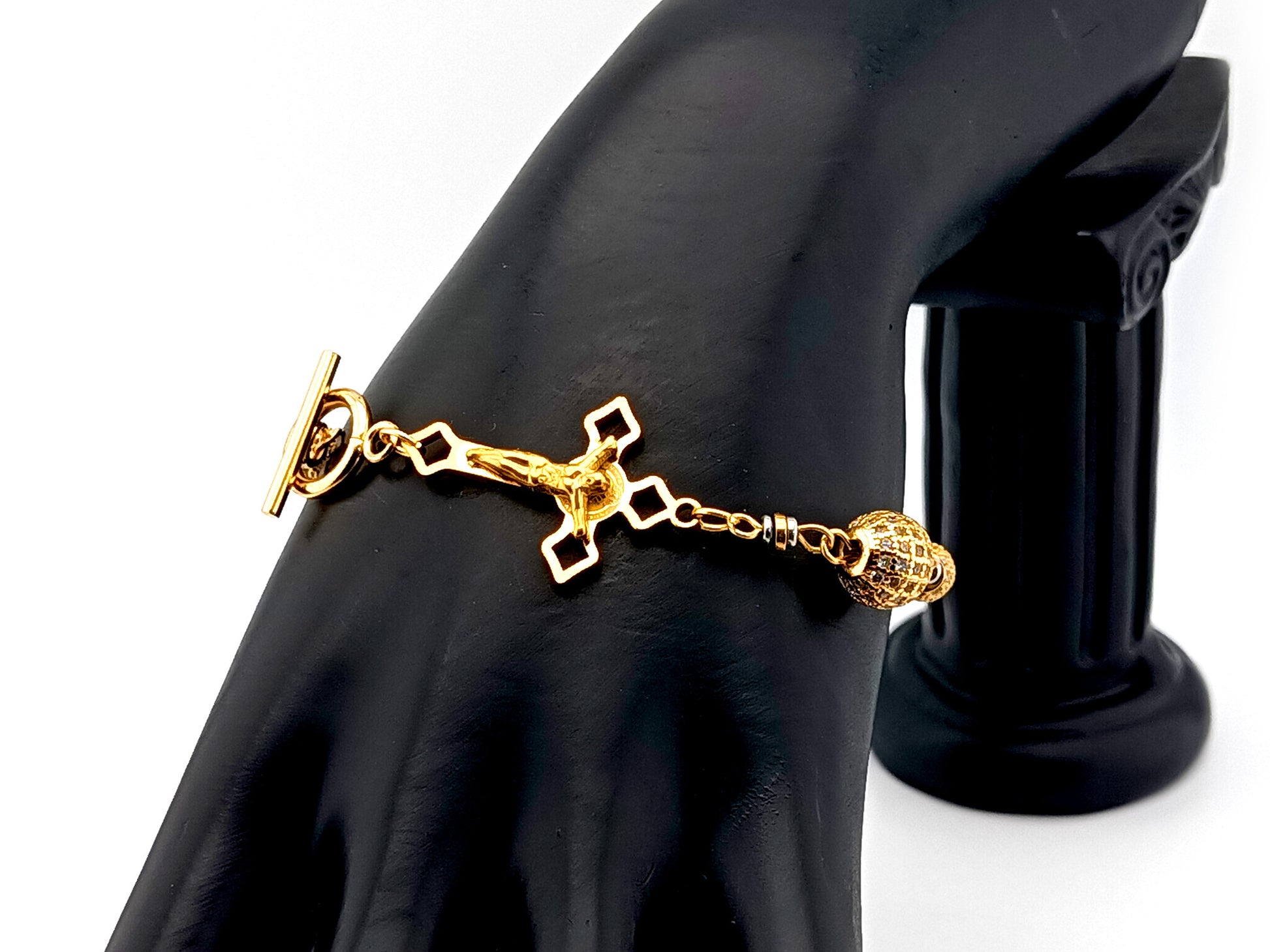 18K Gold cubic zirconia single decade rosary bracelet with gold plated Saint Benedict crucifix.