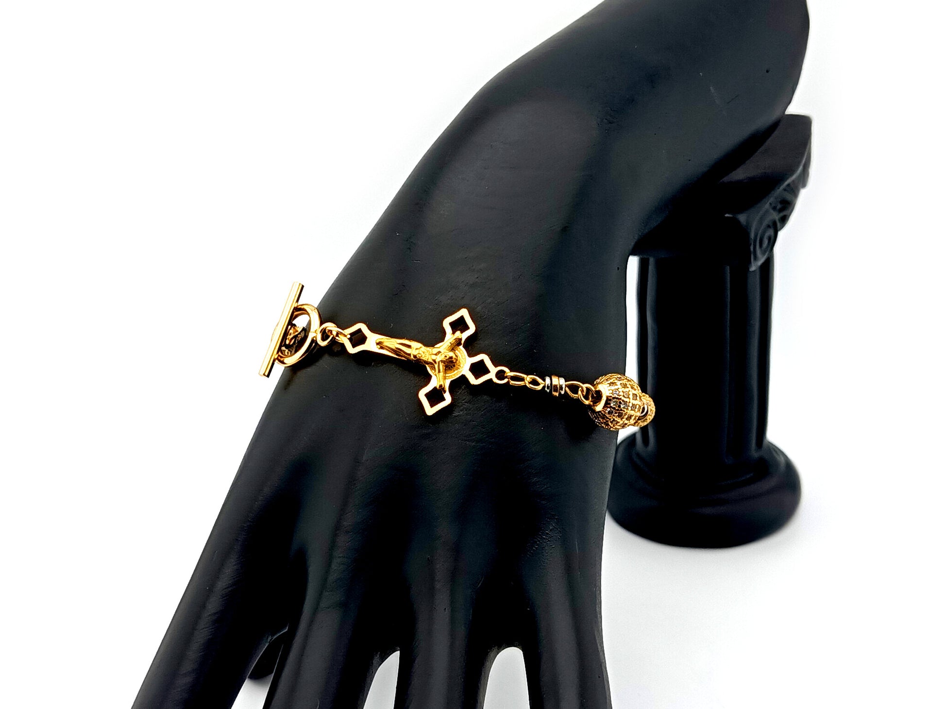 18K Gold cubic zirconia single decade rosary bracelet with gold plated Saint Benedict crucifix.