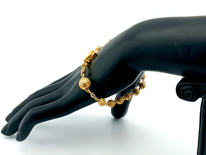 18K Gold cubic zirconia single decade rosary bracelet with gold plated Saint Benedict crucifix.